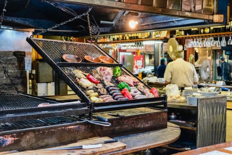 Meats grilling in a local market in Montevideo, Uruguay.